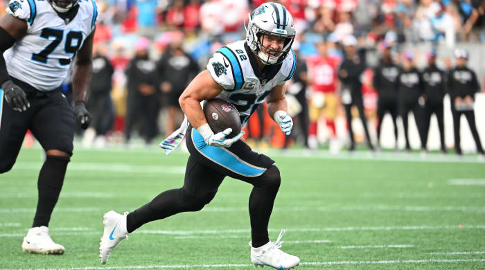 Panthers running back Christian McCaffrey runs for a touchdown.